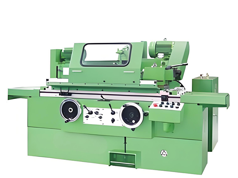 Universal cylindrical grinder with exposed hydraulic components showing precision control valves and actuators